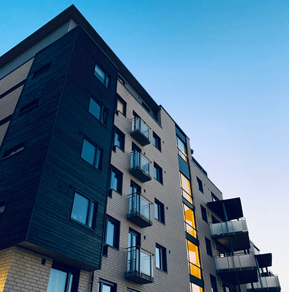 Modern apartment building against a clear sky